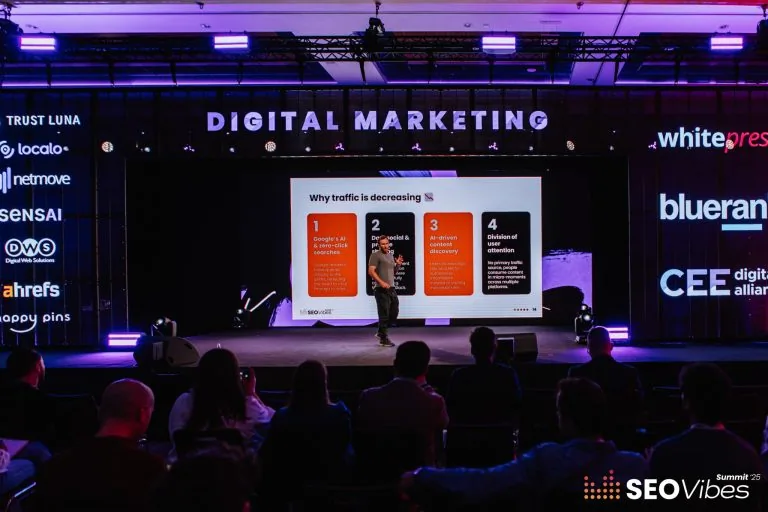 Itamar Blauer speaking at SEO Vibes Summit 2025